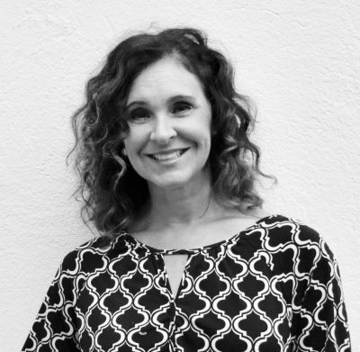 Headshot of Euri Mead in black and white