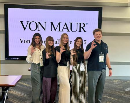 The winners of the Von Maur Challenge lined up at the event.