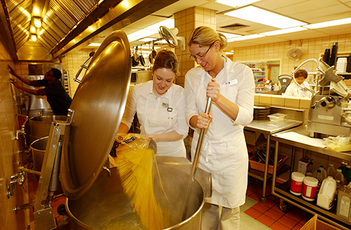 Making spagetti in industrial kitchen