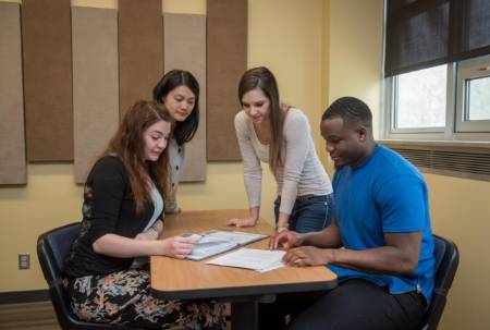 Grad students in Human Services Administration collaborate on a project