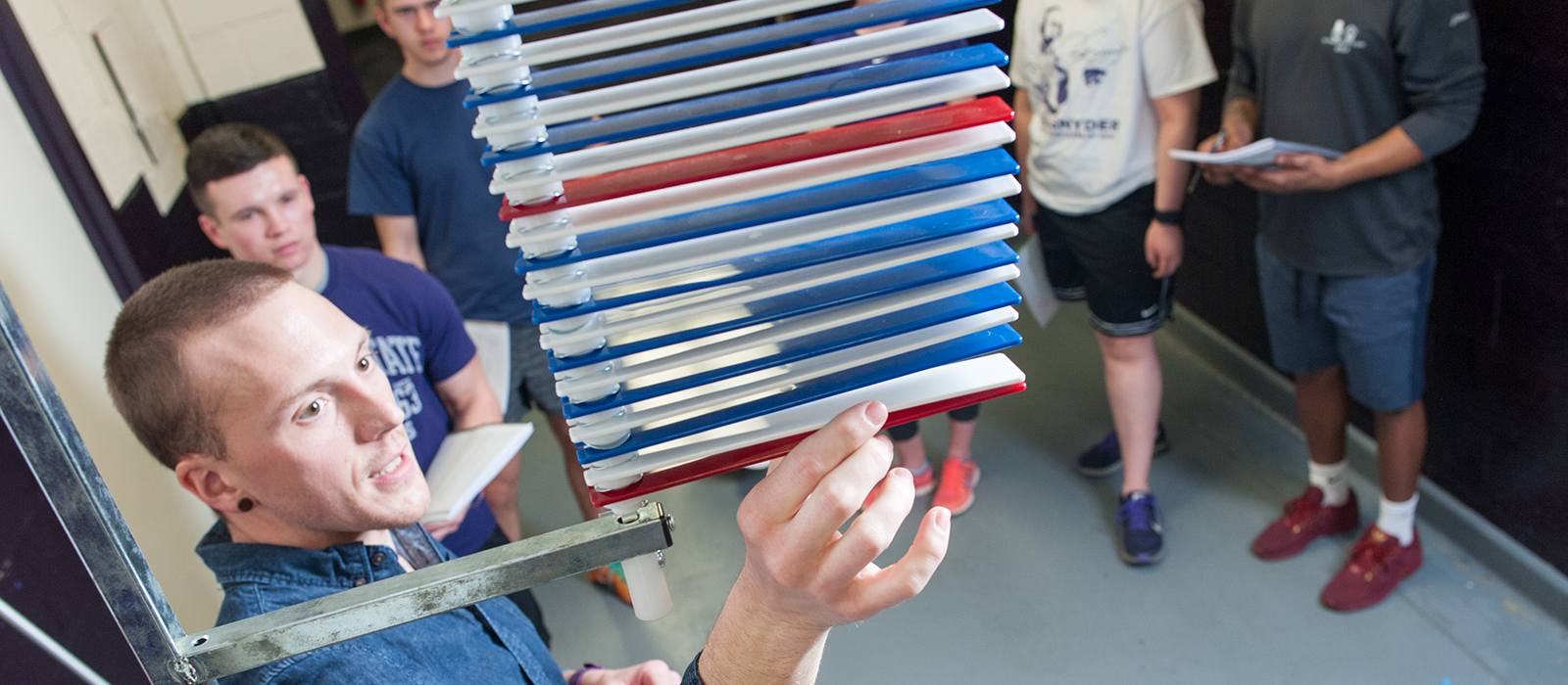 Students doing physical measurement activity