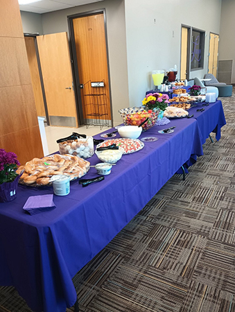 Reception in Hoffman lounge for graduating  online students