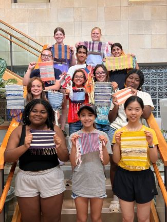 Past campers showing off their project