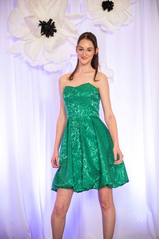 Model in green dress