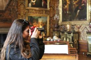 Student taking a photo in England