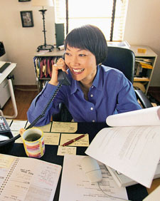 Photo of a person on the phone in an office