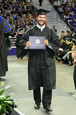 Student receives diploma