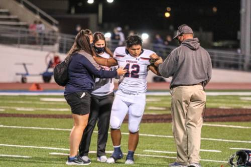 Athletic trainers on the field
