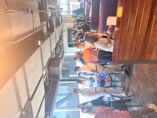 crowd of campers participating in an etiquette dinner