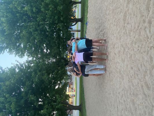 Campers participating in outdoor relays