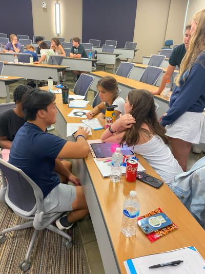 Several campers working in a group